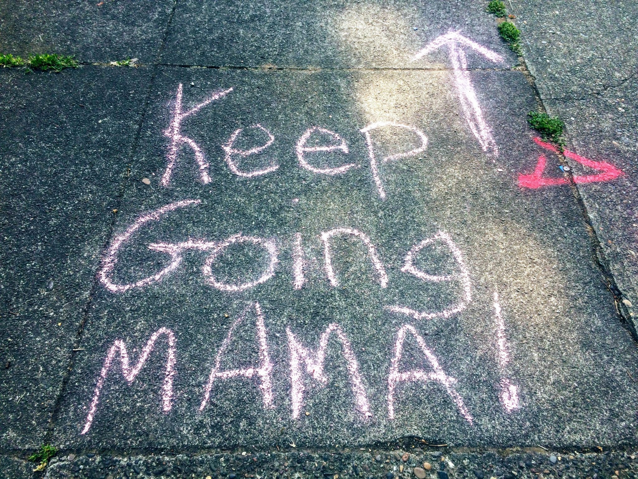 'Keep going Mama!' chalked onto pavement